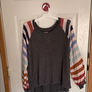 Maurices light sweater with striped sleeves